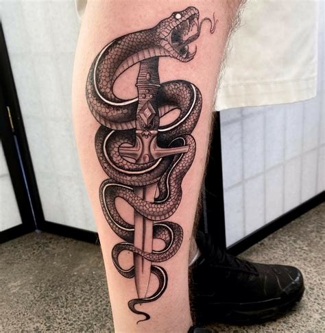 snake wrapped around leg tattoo|Top 10 snake tattoos wrap around leg ideas and inspiration